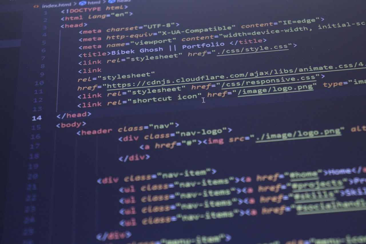 Home Close-up view of HTML and CSS code displayed on a computer screen, ideal for programming and technology themes.