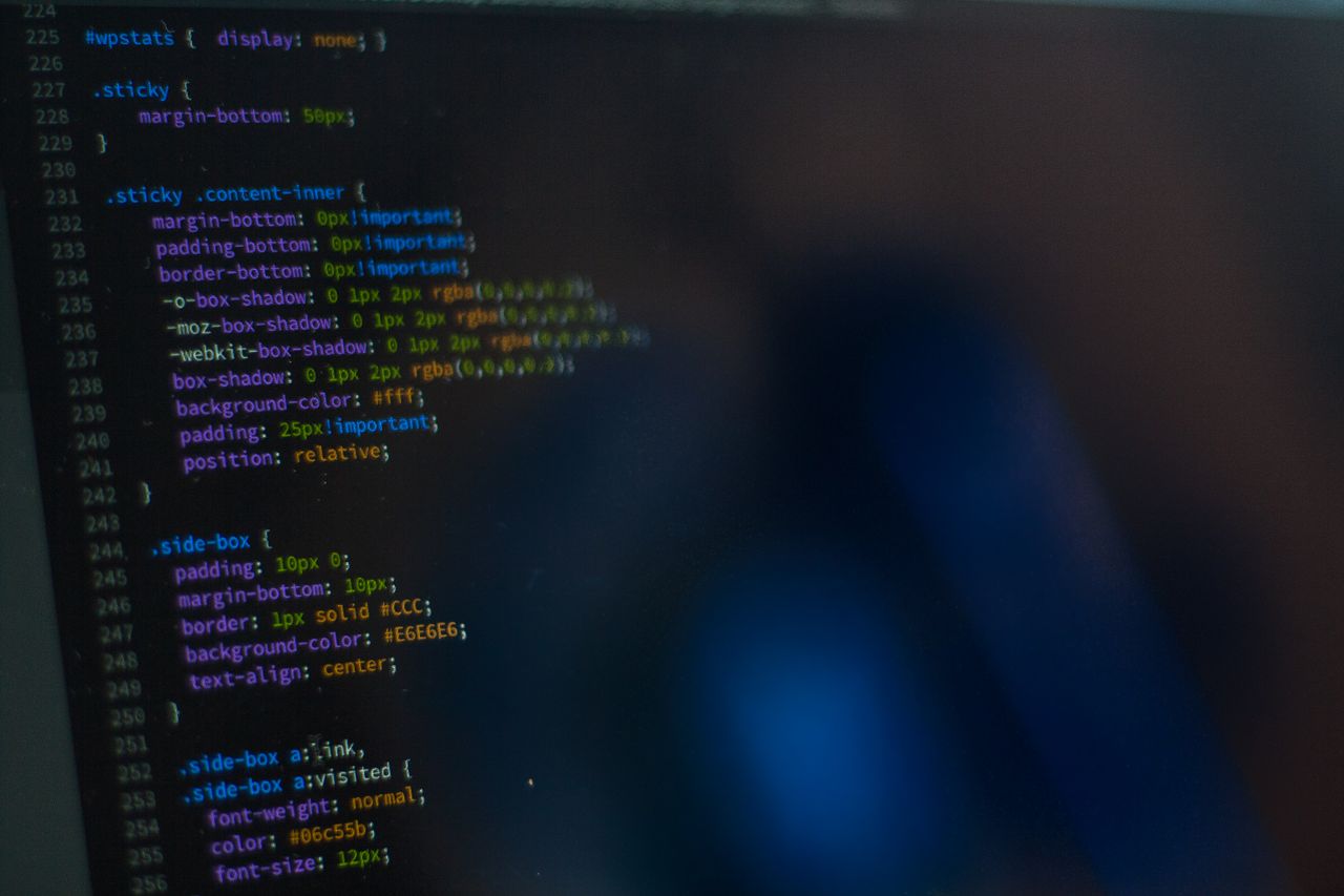 Home Close-up of CSS code displayed on a computer monitor, showcasing web development.